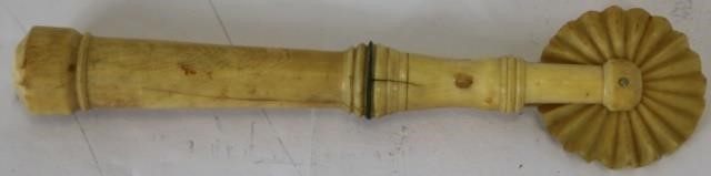 Appraisal: MID- TH C SAILOR MADE PIE CRIMPER TURNEDWHALE'S TOOTH HANDLE