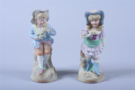 Appraisal: PAIR FRENCH BISQUE FIGURES OF A YOUNG BOY AND GIRL