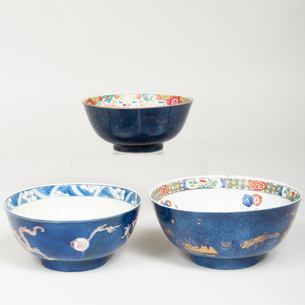 Appraisal: Three Chinese Powder Blue Ground Porcelain Bowls Comprising A bowl