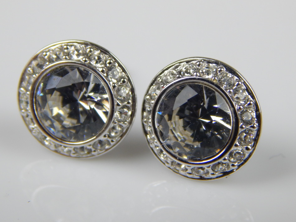 Appraisal: A pair of Swarovski crystal earrings with large centre stone