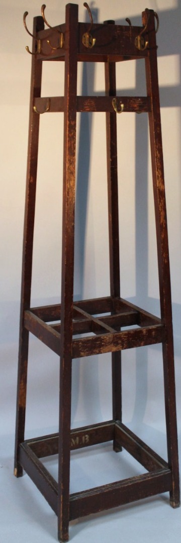 Appraisal: An early thC oak stained hall stand with metal pegs