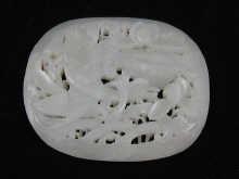 Appraisal: A Chinese jade oval openwork plaque possibly late Ming depicting