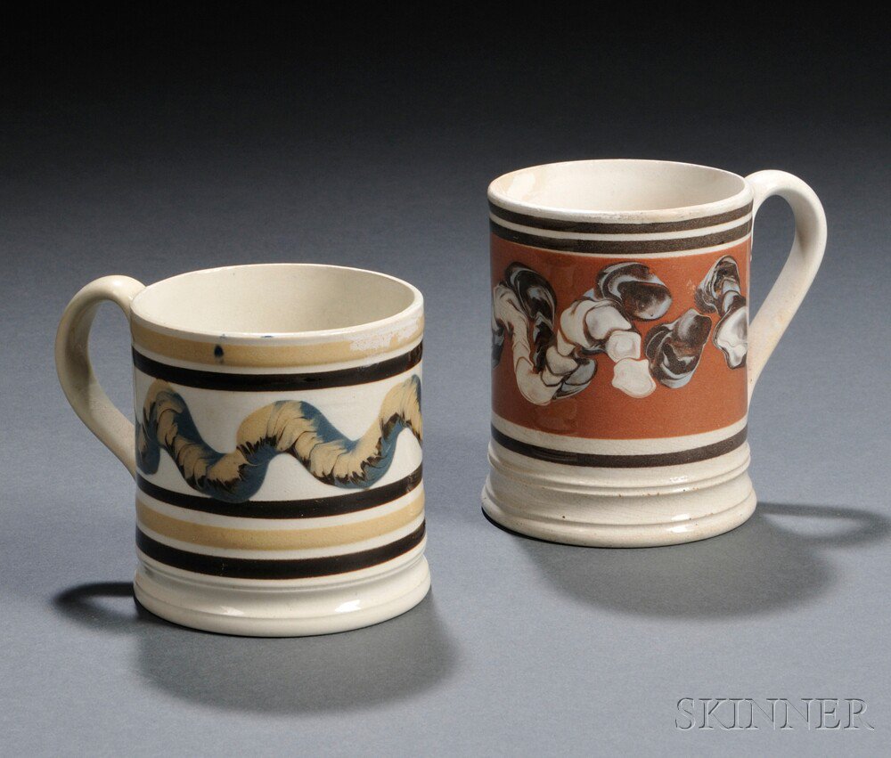 Appraisal: Two Mochaware Pottery Mugs Britain th century a half-pint mug