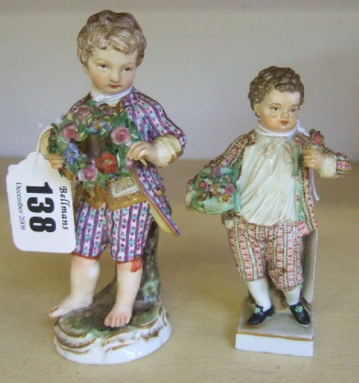 Appraisal: A Meissen figure of a boy holding a garland th