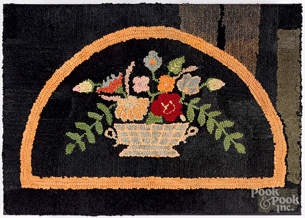 Appraisal: Hooked rug of a flower basket early th c Hooked