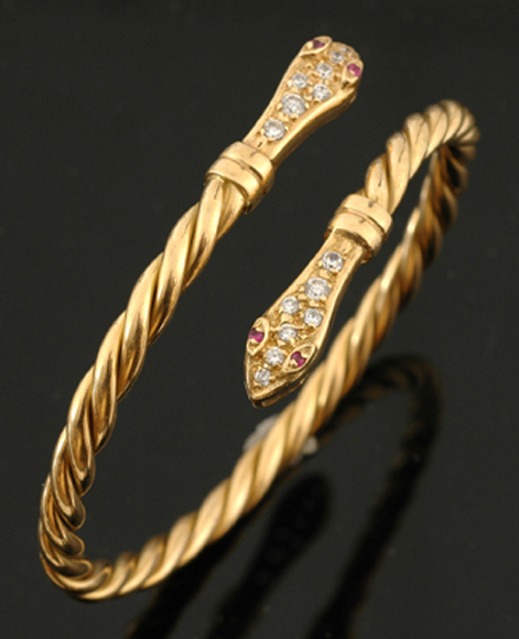 Appraisal: CT GOLD TWIST STONE SET EXPANDABLE SNAKE BRACELET WEIGHING GMS