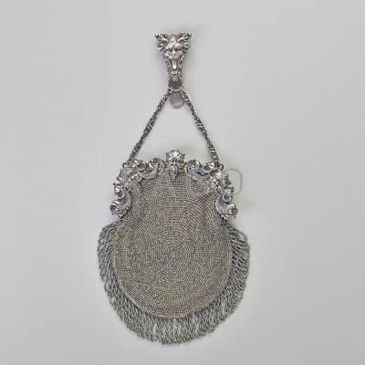 Appraisal: WILLIAM B KERR STERLING MOUNTED RETICULE Embossed frame inhabited by