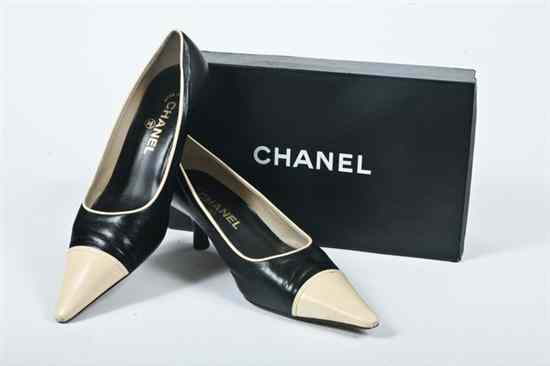 Appraisal: PAIR CHANEL BLACK AND TAN LEATHER SPECTATOR PUMPS Size Includes