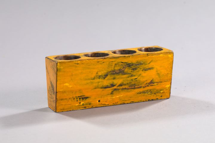 Appraisal: French Provincial Yellow-Painted Wooden Four-Compartment Candle Holder the painted finish