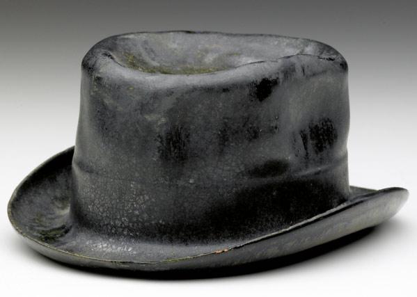 Appraisal: GEORGE OHR Novelty hat covered in gunmetal and bottle green