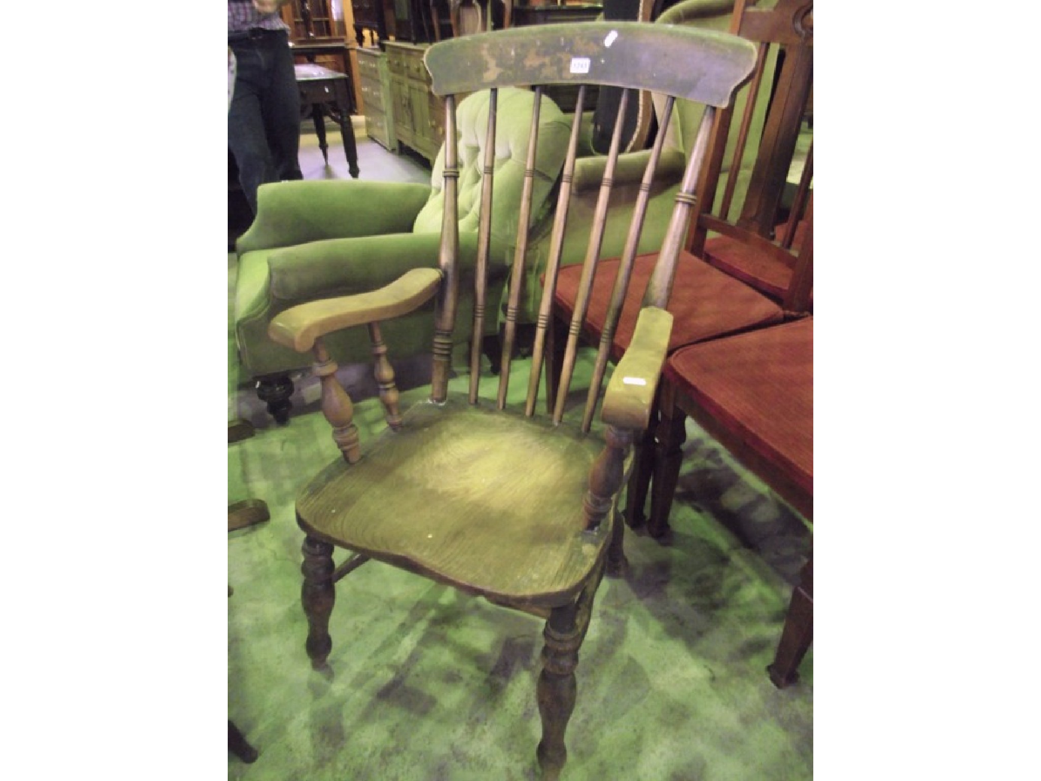 Appraisal: A late th century Windsor elm and beechwood elbow chair