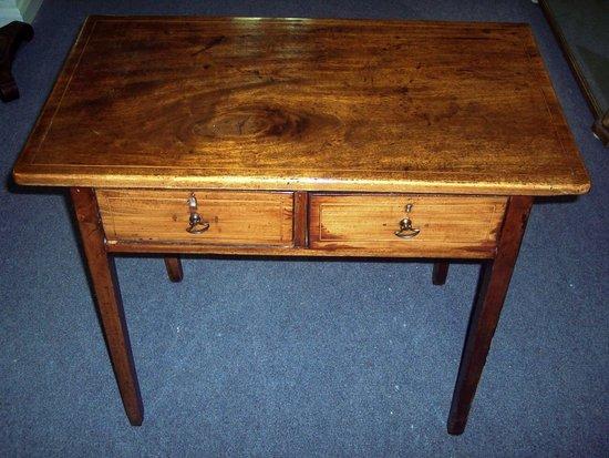 Appraisal: A th Century mahogany and inlaid side table fitted two