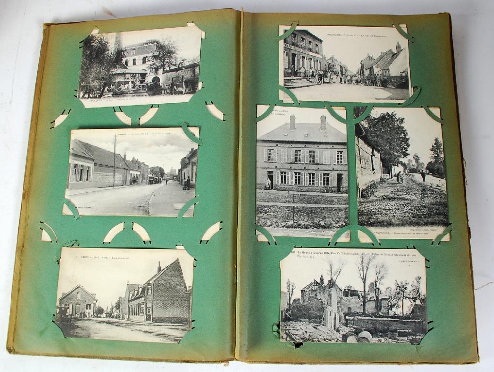 Appraisal: ALBUM OF TOPOGRAPHICAL AND ARCHITECTURAL GREETINGS CARDS mainly views in