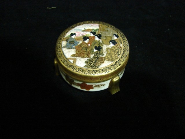 Appraisal: A Japanese Satsuma box and cover painted throghout with Geisha