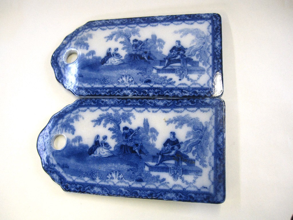 Appraisal: Two Doulton blue and white 'Watteau' pattern stands