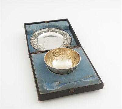 Appraisal: A Victorian embossed Christening bowl and stand in a fitted