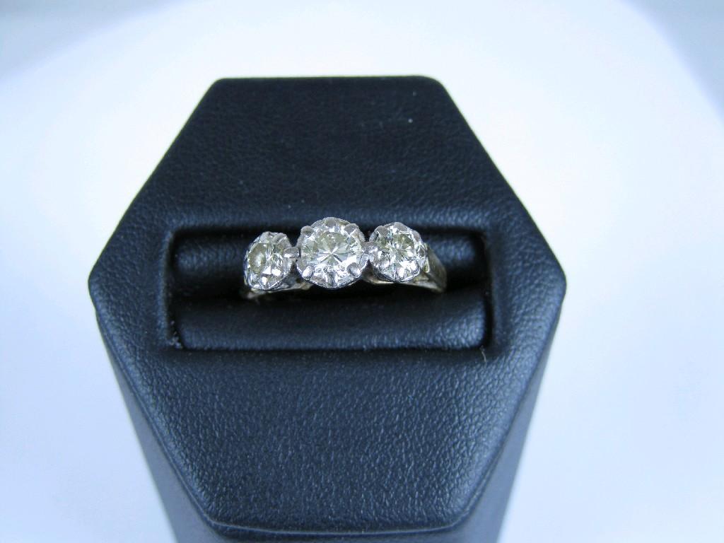 Appraisal: A Diamond three stone Ring the brilliant-cut stones claw-set