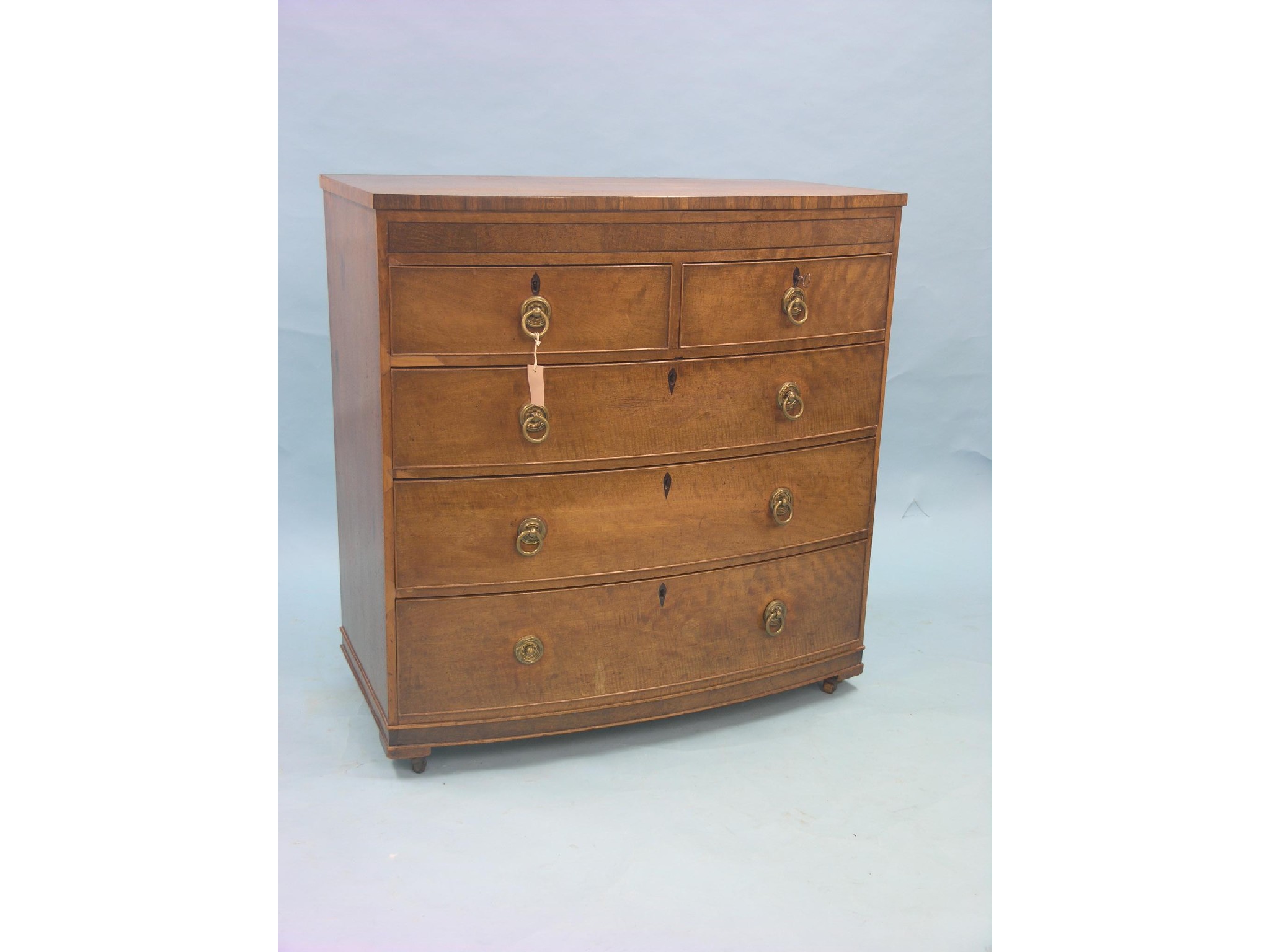 Appraisal: A Victorian mahogany chest bow-fronted with two short and three