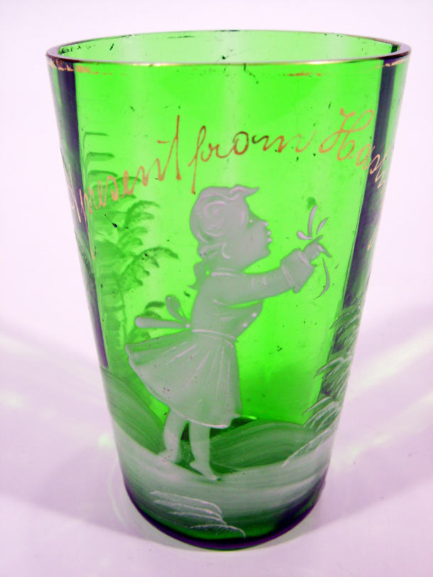 Appraisal: Green Mary Gregory style glass beaker with enamelled figural decoration