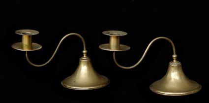 Appraisal: PAIR OF ARTS AND CRAFTS BRASS CANDLESTICKS The weighted bases