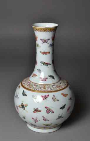 Appraisal: Chinese Large Famille Rose Butterfly VaseLarge bulbous footed porcelain vase