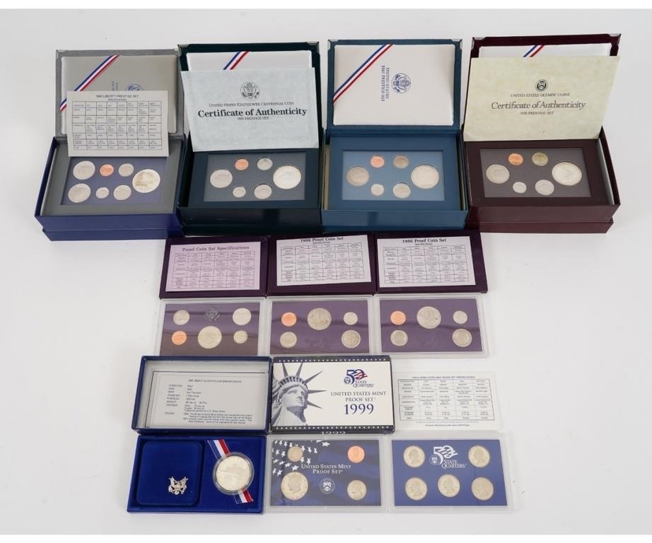 Appraisal: Nine boxed cased coin proof sets Condition Good