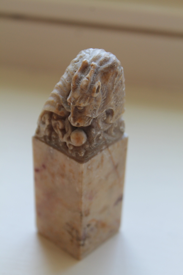 Appraisal: A Chinese soapstone blank seal carved with a dragon and