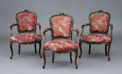 Appraisal: SET OF THREE LOUIS XV CARVED WALNUT FAUTEUILS EN CABRIOLET