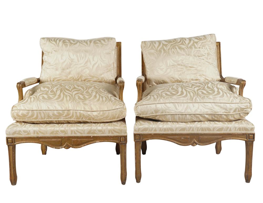 Appraisal: PAIR OF MINTON-SPIDELL CARVED FAUTEUILSeach with label covered with damask