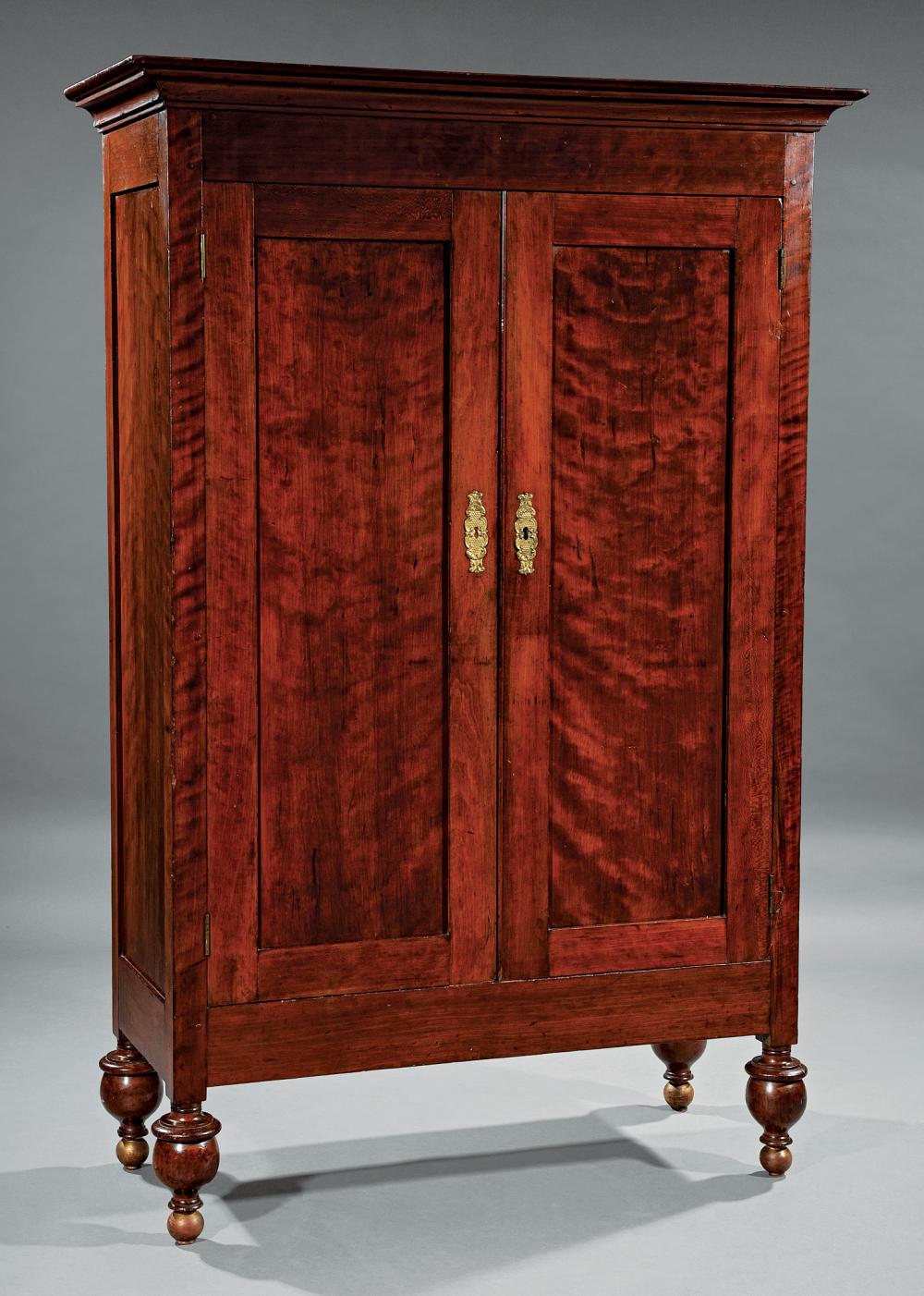 Appraisal: Lower Mississippi Valley Cherrywood Petite Armoire early th c cove-molded