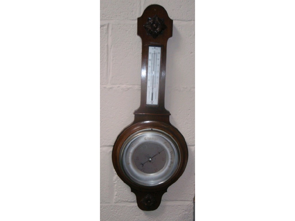 Appraisal: A 's oak aneroid wheel barometer cm high