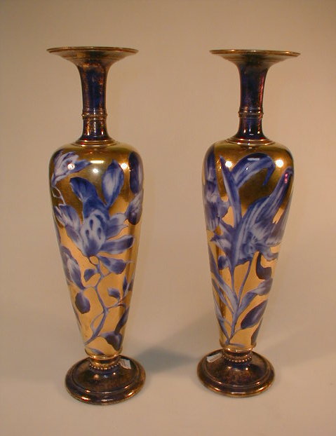 Appraisal: A pair of Thomas Forrester blue and gilt vases circa