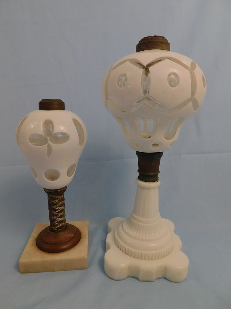 Appraisal: PAIR SANDWICH OVERLAY CUT GLASS LAMPS Pair of th century