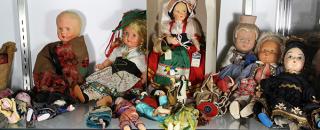 Appraisal: lot of approx One shelf of international dolls - executed