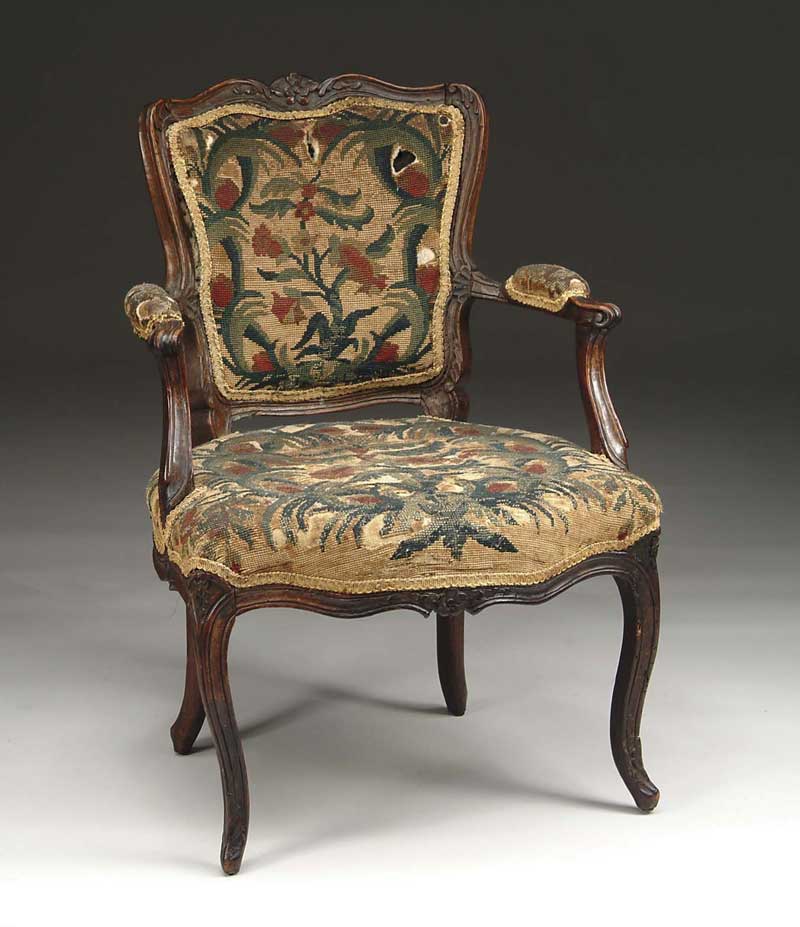 Appraisal: ANTIQUE FRENCH CARVED OPEN ARMCHAIR Over upholstered seat with upholstered