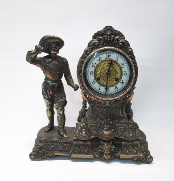 Appraisal: WATERBURY CLOCK CO FIGURAL MANTEL CLOCK having cavalier swordsman Don