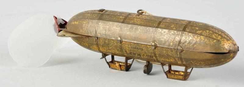 Appraisal: Tin Lehmann Zeppelin Wind-Up Toy German Working Marked EPL Replaced