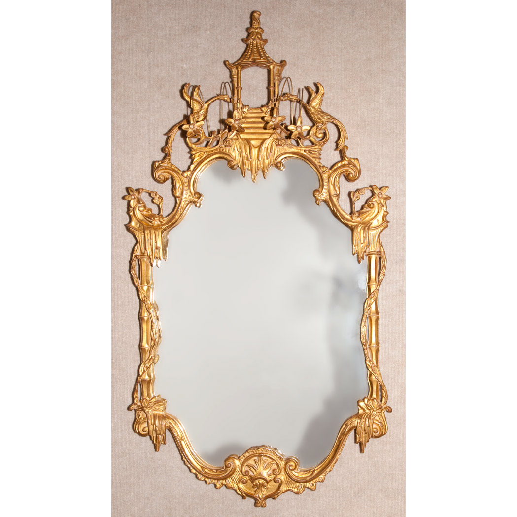 Appraisal: George II Style Giltwood Pier Mirror The shaped mirror plate