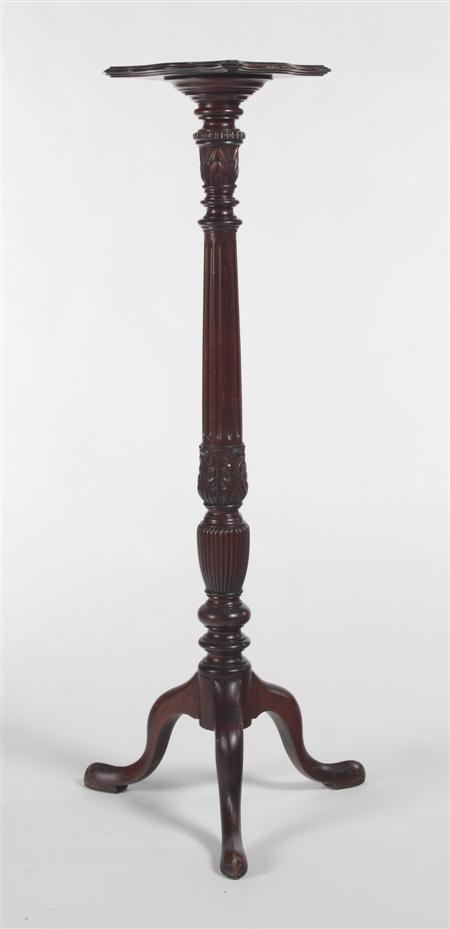 Appraisal: A late th century mahogany torchere the moulded serpentine top