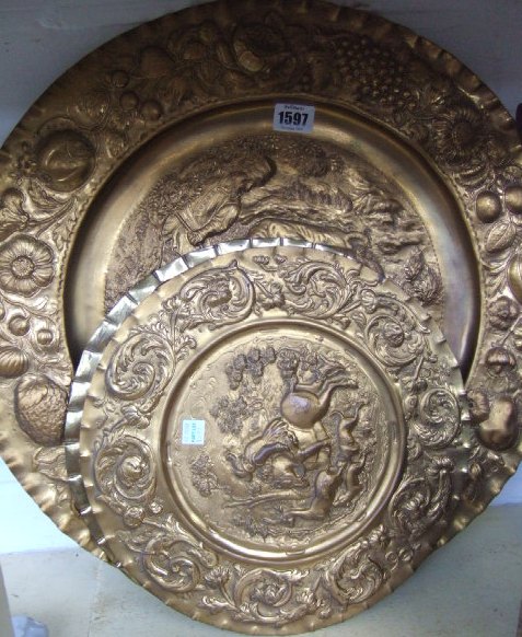 Appraisal: A th century German gilt metal embossed charger and three