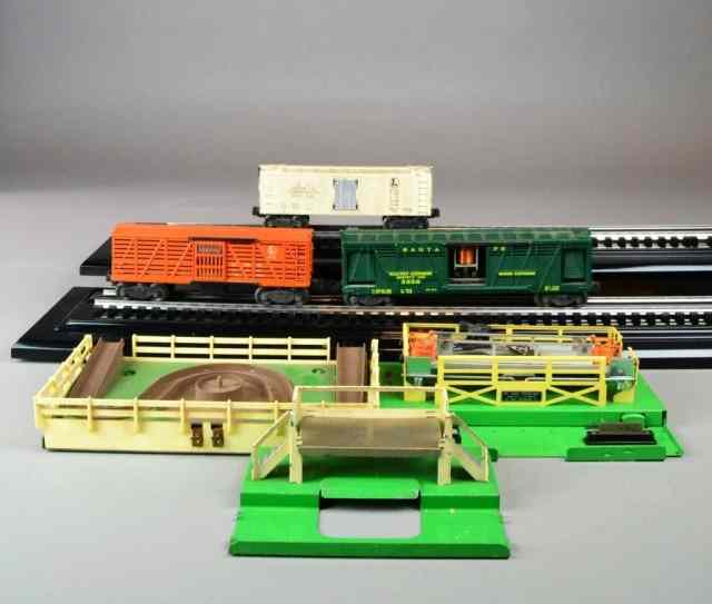 Appraisal: Various Lionel Cars AccessoriesTo include Lionel armor operating cattle car