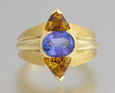 Appraisal: A Ladies' Tanzanite and Golden Topaz Ring k yellow gold