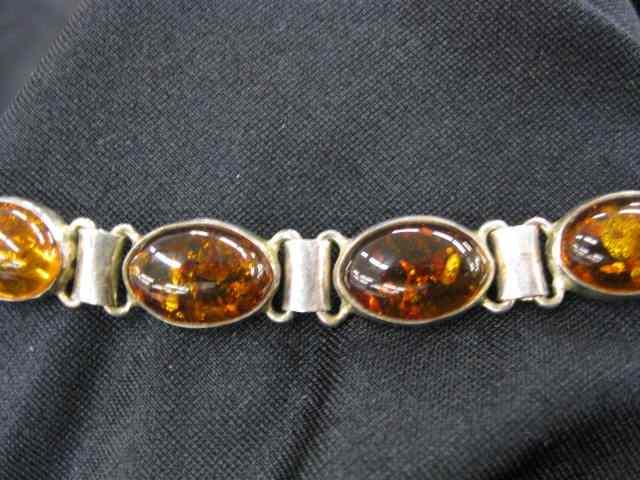 Appraisal: Amber Sterling Silver Bracelet oval cabochons hallmarked ''