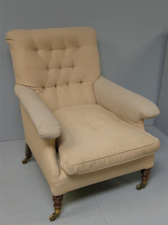 Appraisal: Victorian upholstered button back armchair on turned legs PROVENANCE Thetis