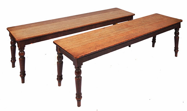 Appraisal: A PAIR OF TH CENTURY OAK BENCHES with rectangular seats