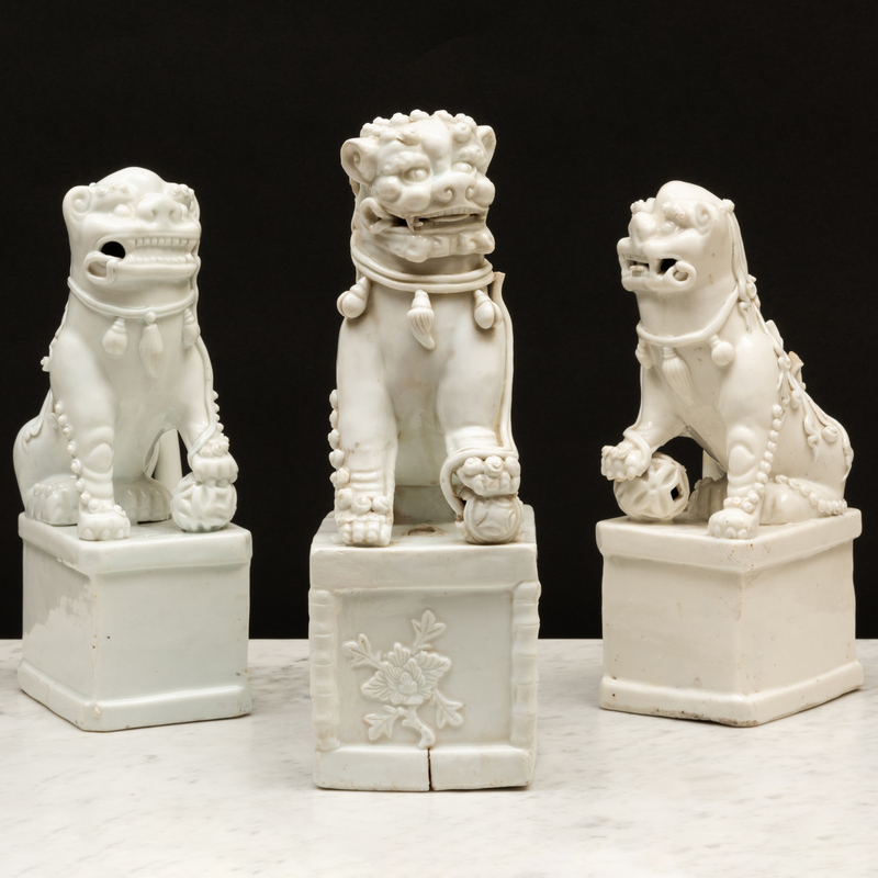 Appraisal: Group of Three Blanc de Chine Porcelain Buddhistic Lions Unmarked