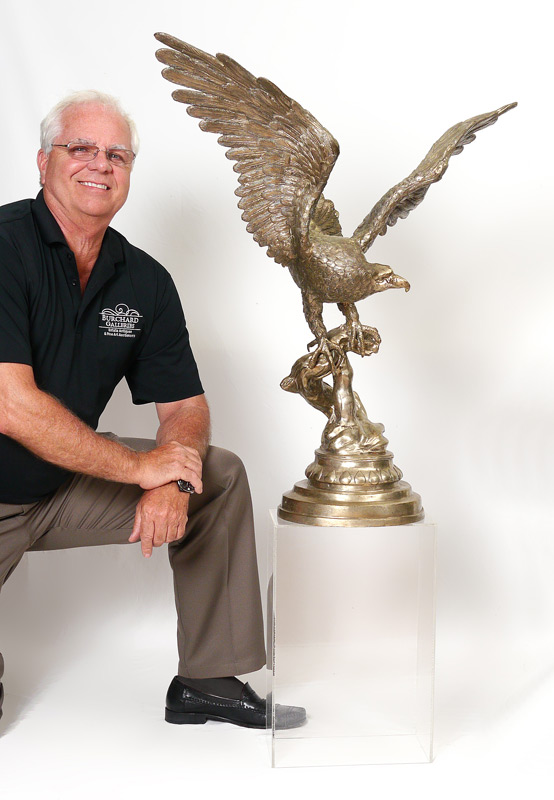 Appraisal: CAST METAL SCULPTURE OF AN EAGLE Heavy casting in silver