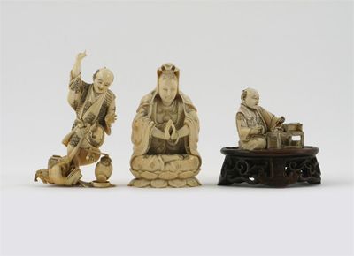 Appraisal: Three ivory figures one trying to catch a rat another