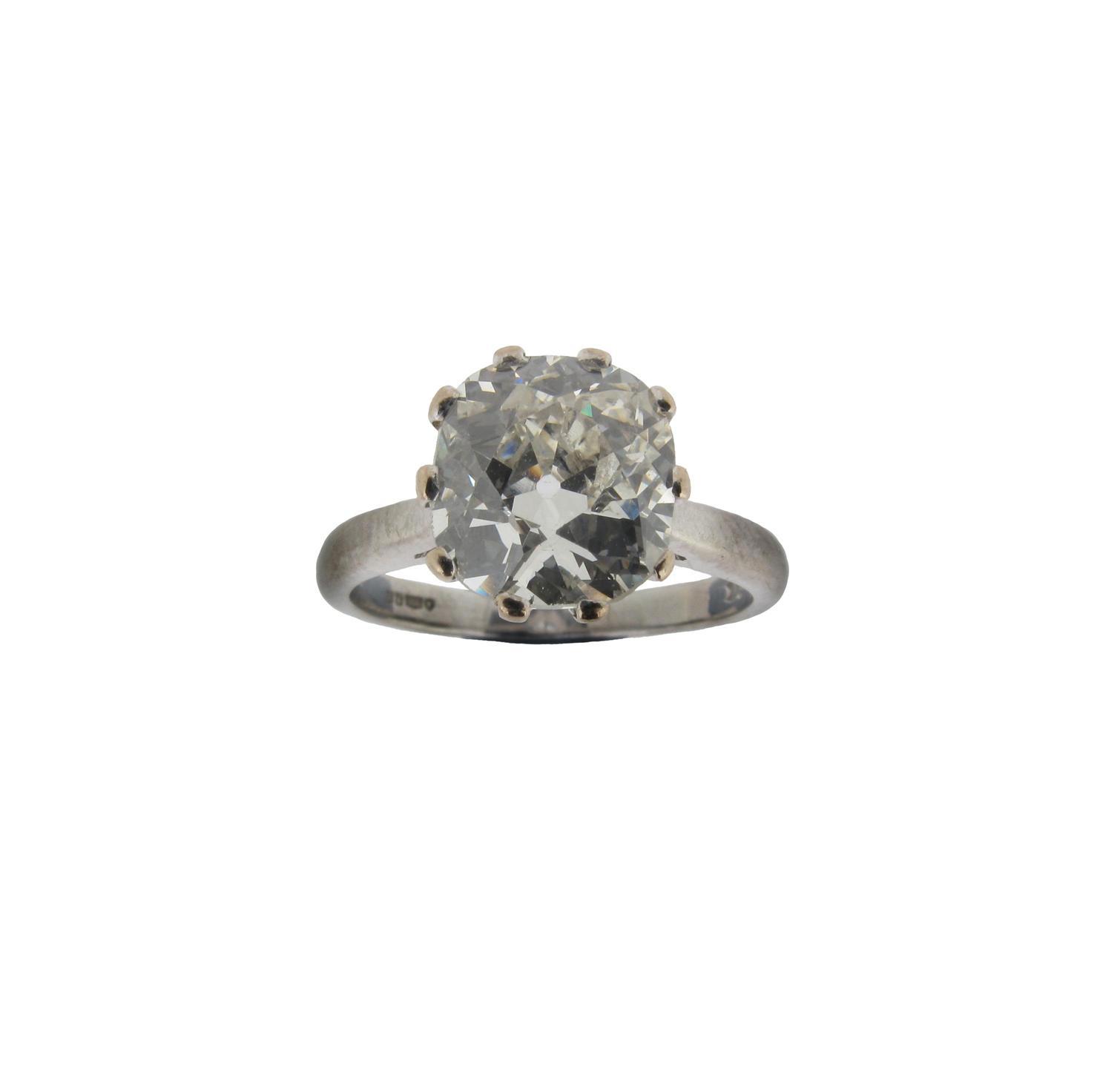 Appraisal: A cushion shaped diamond set solitaire ring