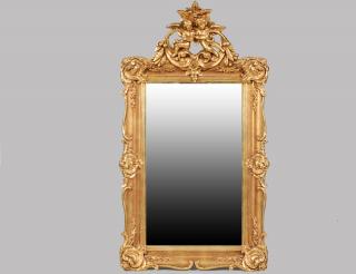 Appraisal: LOUIS XV STYLE GILT MIRROR With rectangular mirror plate surmounted